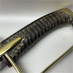 18th century French Light Dragoons trooper's sword c1770, the 84cm curving fullered blade with traces of engraved battle trophies, brass hilt with knucklebow, oval langets and leather grip L97cm overall (no scabbard)