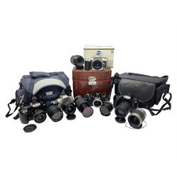 Four Minolta camera bodies, to include Dynax 500si, serial no. 94812651 with 'Signa Zoom 1;3.5-4.5 f=28-70mm' lens, Maxxum 300si, serial no. 97821665, with 'Tamron AF 80-210mm' lens and Dynax 300si, serial no 01603265'  with Minolta AF Power Zoom 35-80mm 1;4' lens, etc, together with Pantax MV1 camera bodies and other camera equipment 