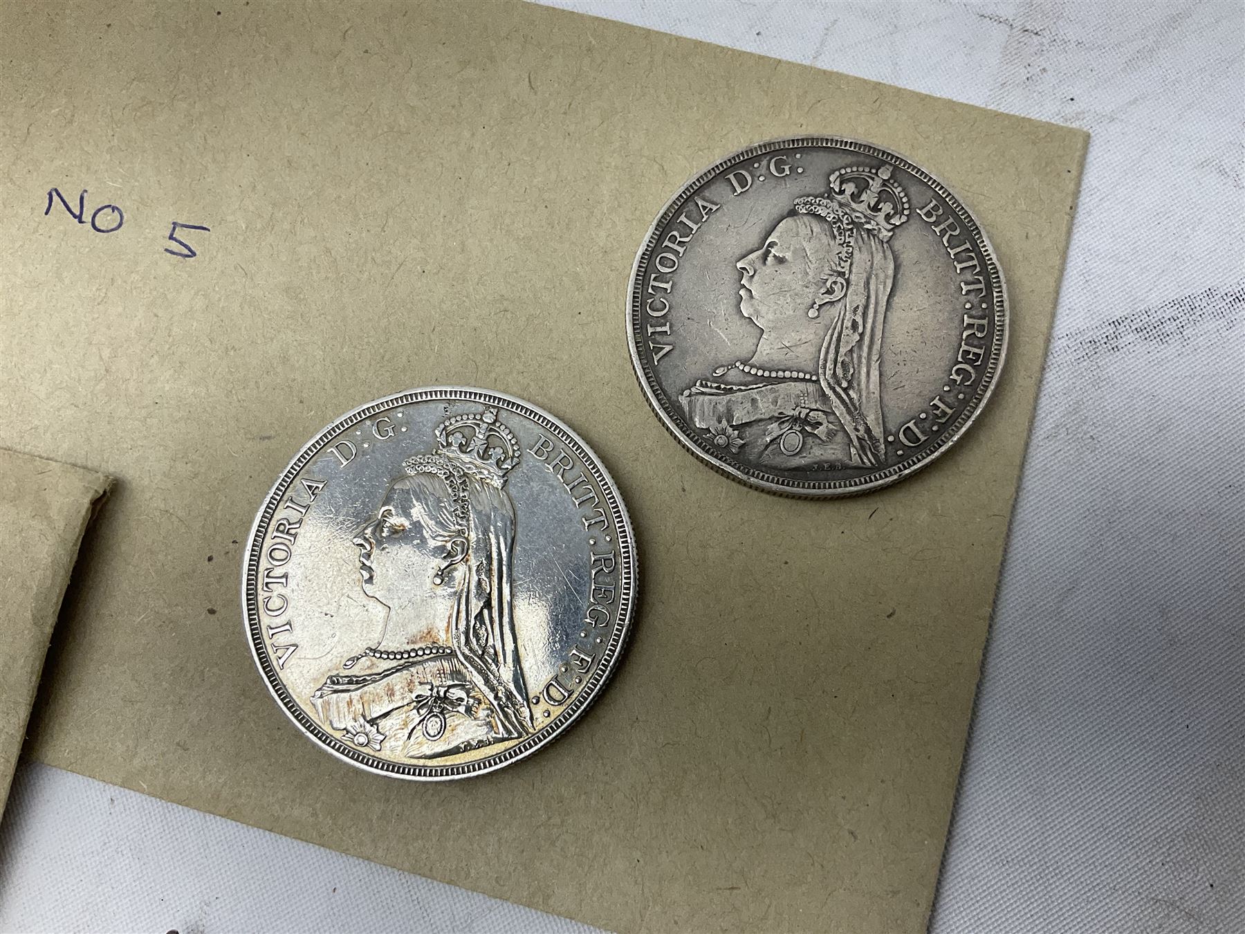 Mostly Great British coins including Queen Victoria 1887 and 1888 crowns, pre-decimal coinage, various five pound coins etc and a WWI War and Victory medal pair named to '16903 PTE. H. SCHOFIELD. 2-CO. OF LOND. Y.'