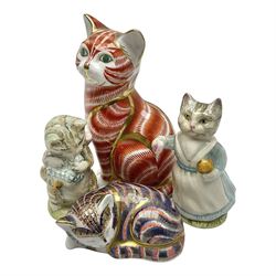 Two Royal Crown Derby paperweights,  Seated cat and sleeping cat, both with gold stoppers, together with two Beswick Beatrix Potter cats