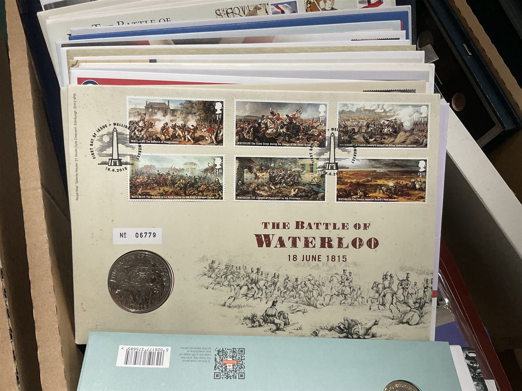 Approximately one hundred and fifteen Royal Mint coin covers, in two ring binder folders and loose, together with approximately 53 grams of Great British pre-1920 and approximately 68 grams of Great British pre-1947 silver threepence coins, and a small quantity of further pre-decimal coins