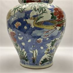 19th century Chinese Wucai vase and cover, decorated  with peacock on blue rockwork and other birds flying amongst tree peonies, H43cm