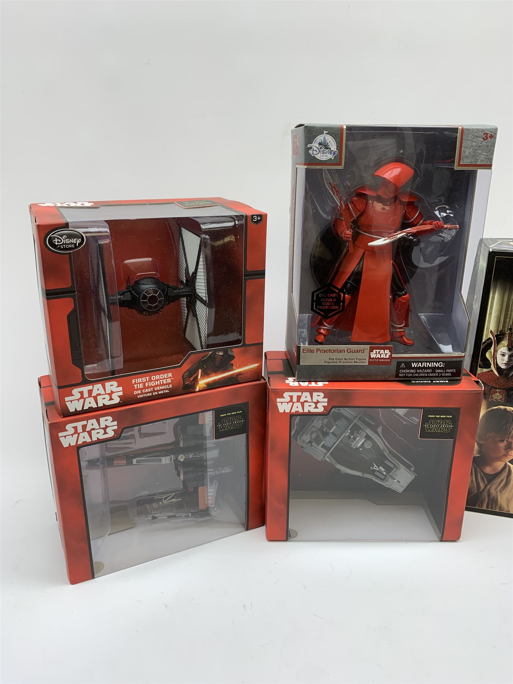 Star Wars - Disney Store The Force Awakens figurine playset, Poe's X-Wing Fighter, Snowspeeder and First Order Tie Fighter; Solo figurine set; The Last Jedi Elite Series die-cast action figure of Praetorian Guard; all mint and boxed; together with Star Wars Episode 1 card game, boxed (7)