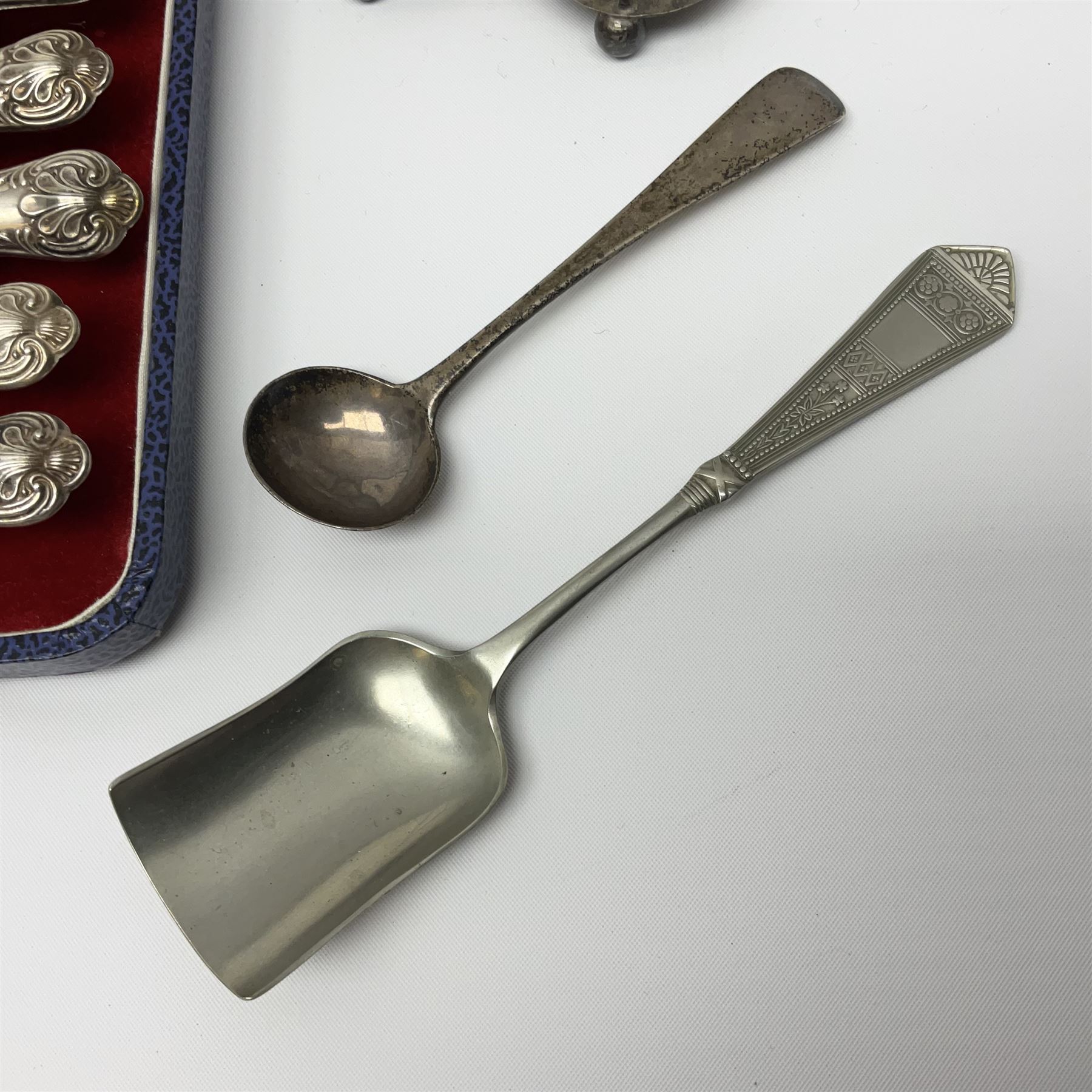 Victorian silver cut glass cruet set on stand, with diamond cut bodies, a set of six silver handled cake forks, cased, a Georgian silver mustard spoon and a silver plated shovel spoon, all hallmarked 
