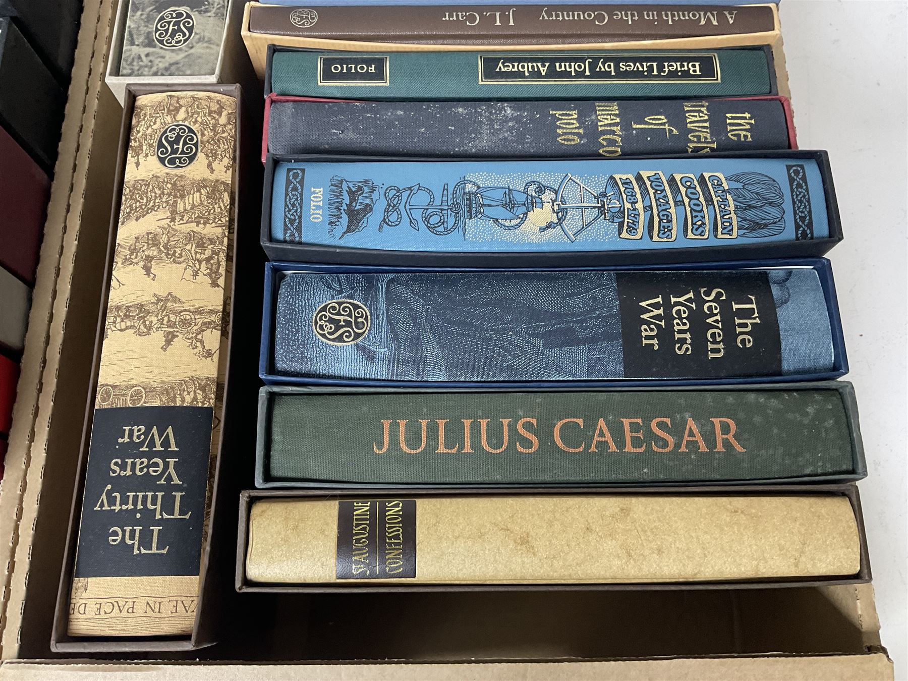 Folio Society; twenty eight volumes, including The Seven Year War, The Boer War, The Ottoman Empire, The Moons a Balloon, Captain Cooks Voyages etc 