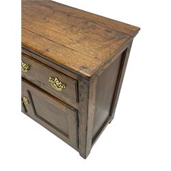 George III country oak dresser base,  rectangular top over with three central drawers flanked by two drawers and two panelled cupboards, each with moulded fronts, on stile feet