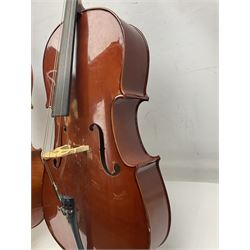 Modern Hungarian half-size cello with 69cm two-piece maple back and ribs and spruce top L114cm overall; and Stentor half size cello bearing label 'The Stentor Student II'; each in soft carrying case (2)