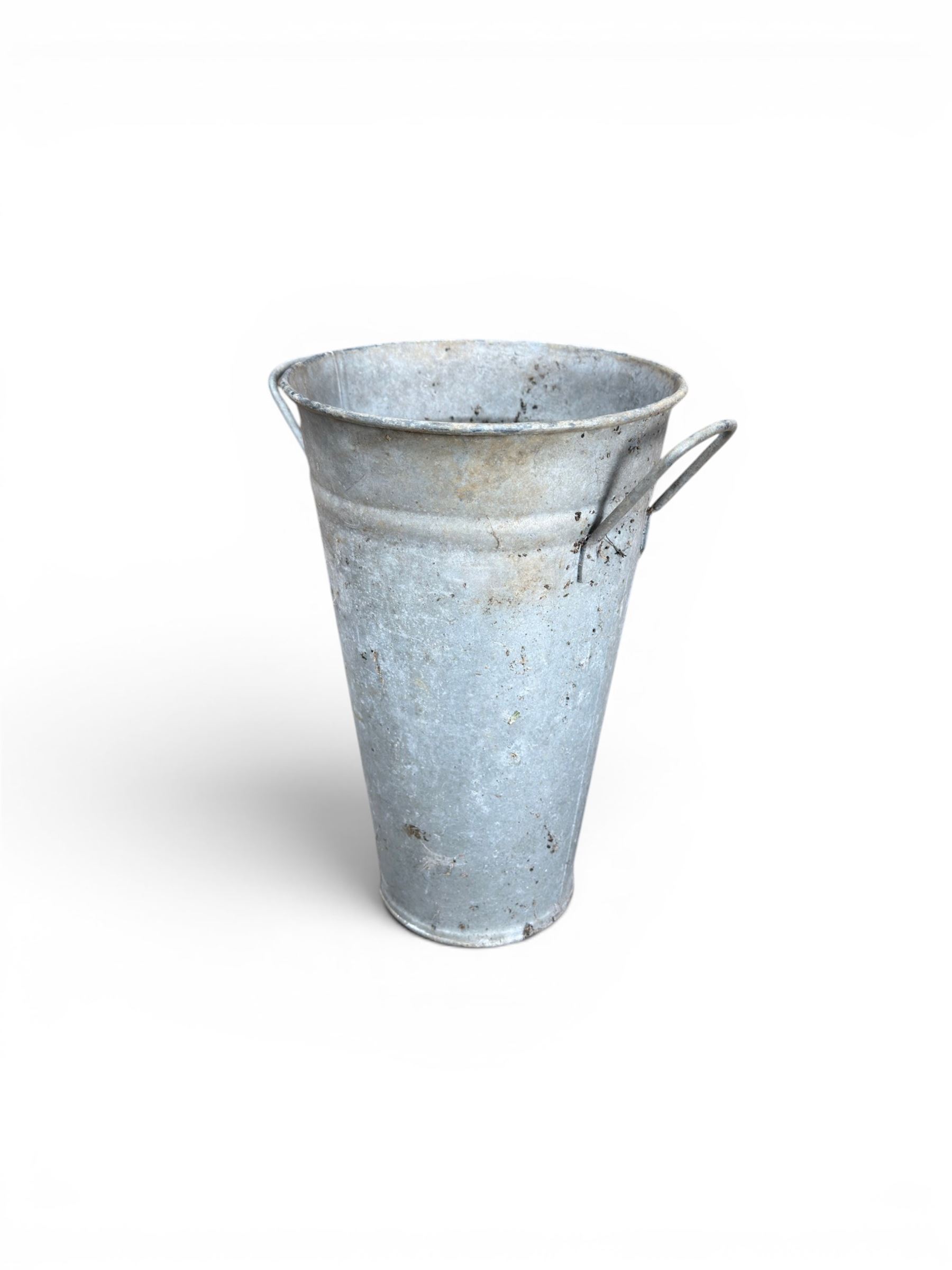 Nine galvanised flower buckets, tapering form with twin handles