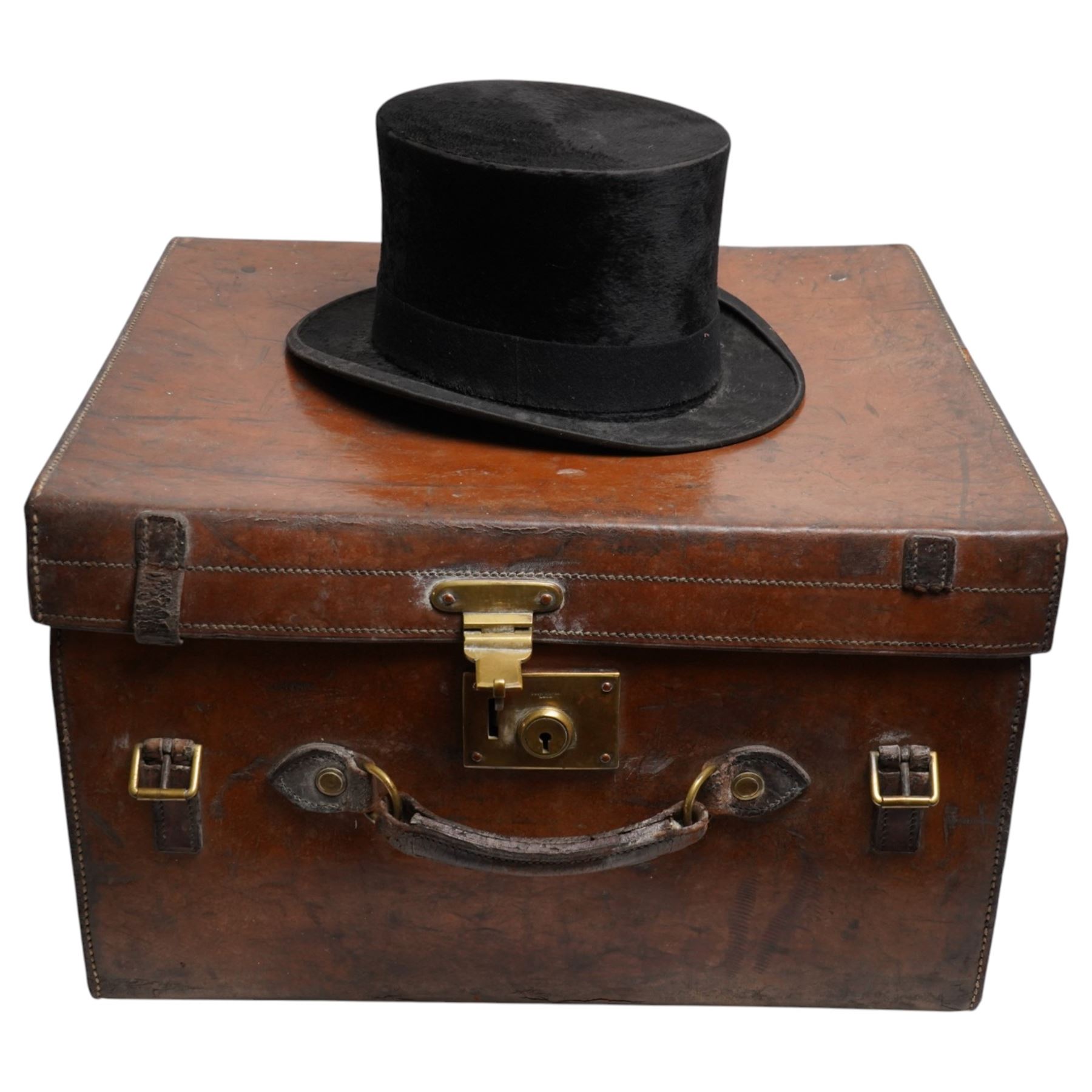 Victorian leather travelling case for hats, with C.A. Dunn top hat, the case with impressed Army & Navy Makers mark, the lid with the initals W.S.H.S, with key, H31cm, W45cm, D50cm