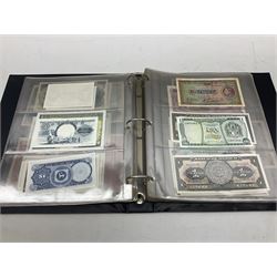 World banknotes, including Queen Elizabeth II The States of Jersey one pound 'DB202703', five pounds 'BB527762' and ten pounds 'AB651481', reserve bank of New Zealand two dollars '1L3 741894', King George V Straits Settlements one dollar 1st January 1935 'F/83 28924', various Bank of England notes etc, housed in two ring binder albums