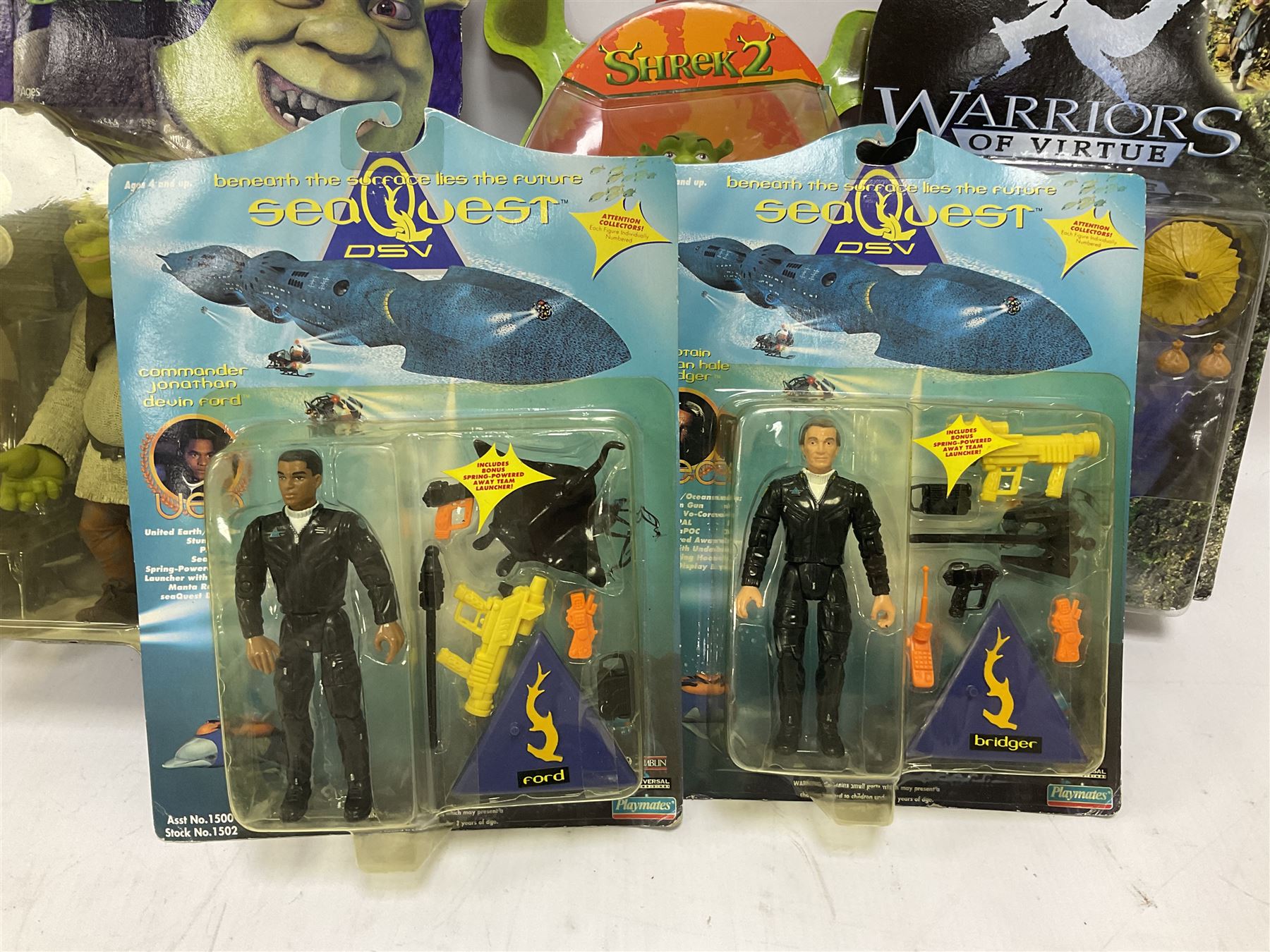 Seventeen TV & film related carded action figures comprising four Pirates of the Caribbean; five Shrek; three Star Trek; two Sea Quest DSV; Captain Scarlet, Warriors of Virtue; and Jurassic World; all in unopened blister packs (17)
