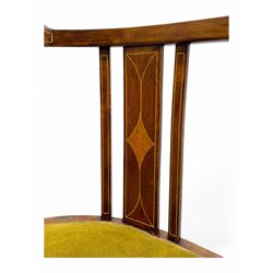 Pair of early 20th century Edwardian inlaid mahogany elbow chairs, shaped top rails with central diamond motif and line inlays, flanked by turned uprights, green velvet seats, on square tapered legs