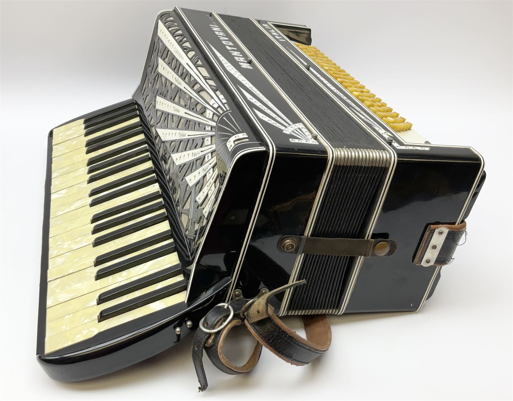Italian Mantovani piano accordion with Art Deco style black and white case, twenty-four keys and one-hundred and twenty buttons L52cm in carrying case