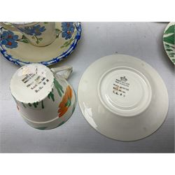Art Deco tea service for six by Myott, Son & Co, painted with stylised orange and yellow flowers amongst green foliage on plain ground, together with a similar unmarked part tea service decorated with blue flowers