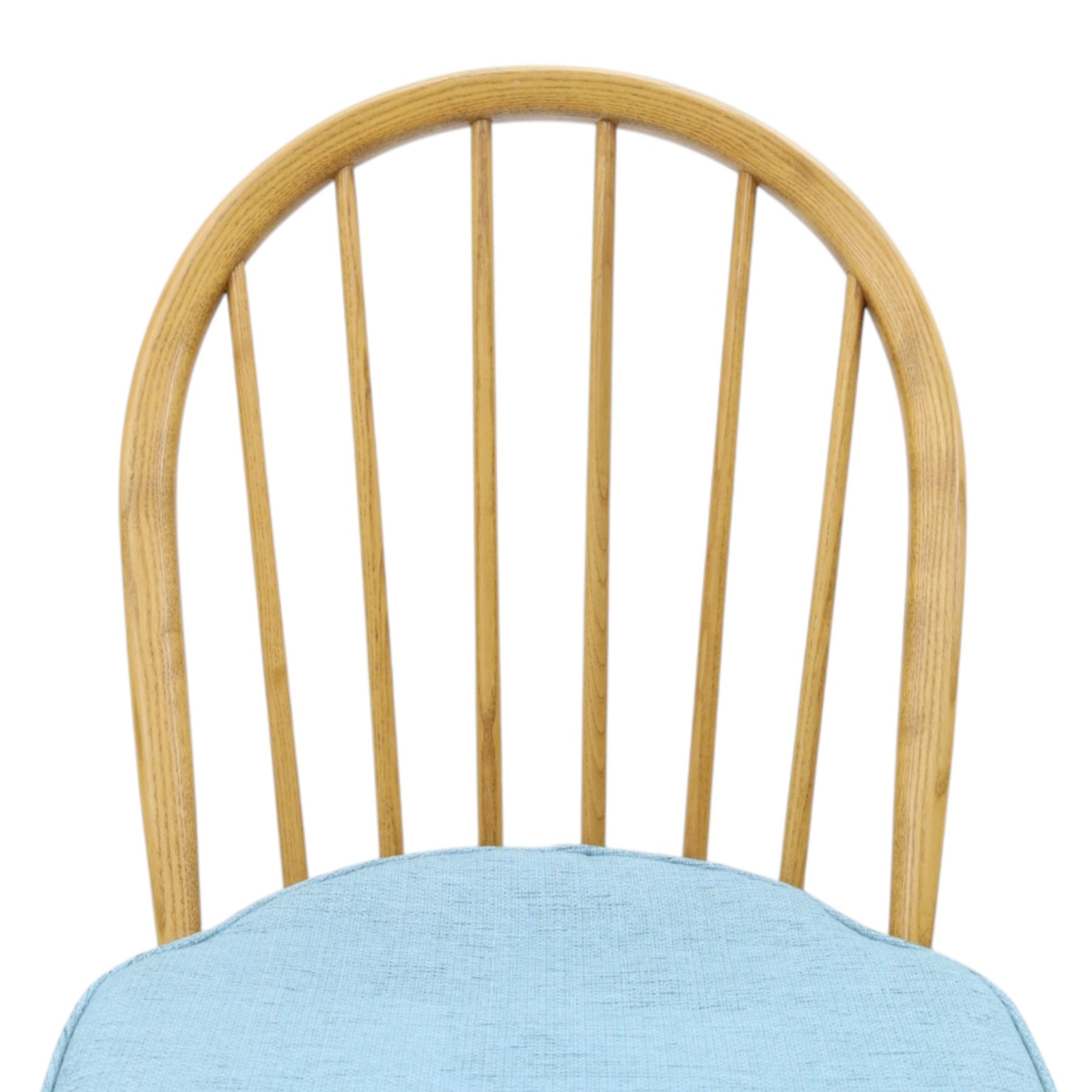Ercol - pair of 'Windsor' dining chairs, with high hooped back, blue seat cushions with studded, tapered supports  