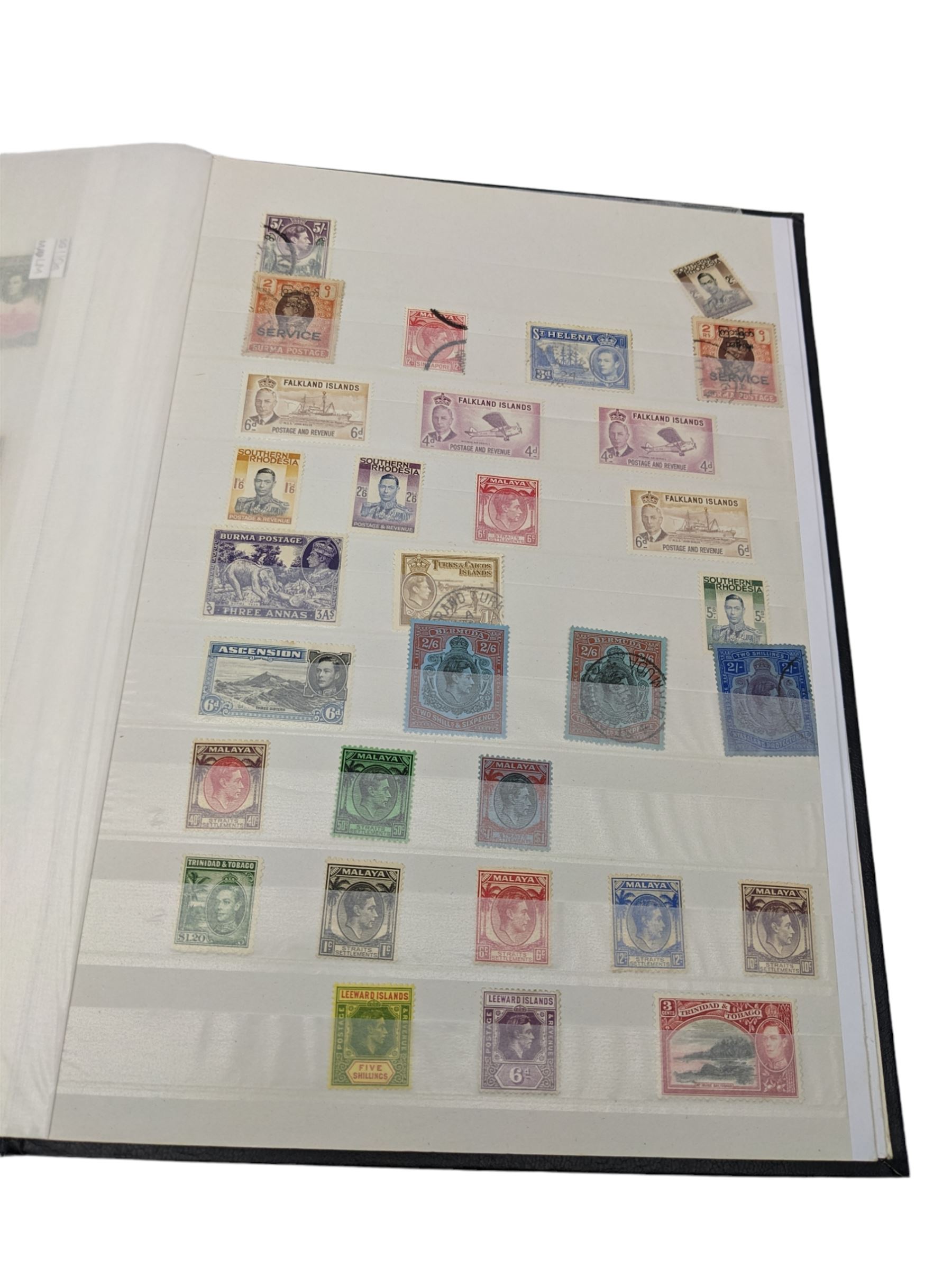 World Stamps including Seychelles, Southern Rhodesia, Sudan, Cyprus, Bermuda, Queen Victoria Canada, King Edward VII Straits Settlements etc, mixture of mint and used values, housed in a black stockbook