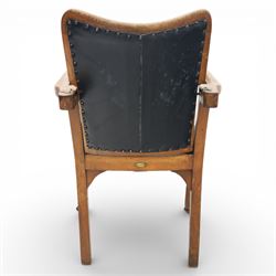 20th century oak recliner armchair, the curved back upholstered in leather with brass stud edging, hinged reclining back operated by side ratchet fittings, leather upholstered seat, shaped open arms, raised on cabriole legs