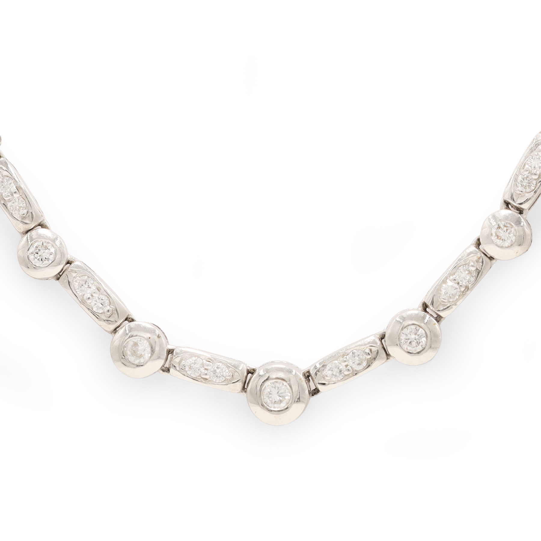 18ct white gold diamond necklace, bezel set with a single round brilliant cut diamond, spaced by two further diamonds, to a rectangular link necklace, London 2000, total diamond weight approx 0.75 carat