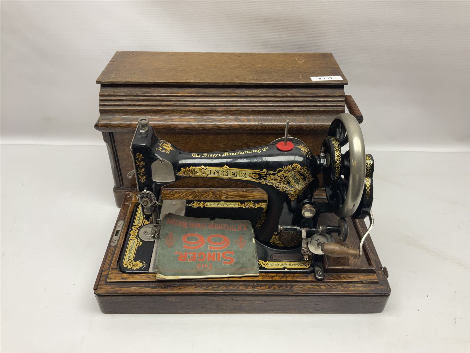 Singer 66 sewing machine in wooden case, together with an LG DVD player with speakers, two portable DVD players, etc 