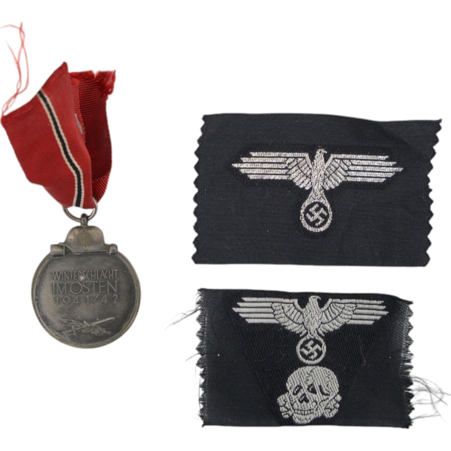 German Eastern Front Medal together with two Third Reich style insignias
