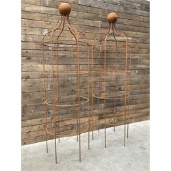 Pair of Country House wrought iron garden obelisks with ball finial, raise in four tiers