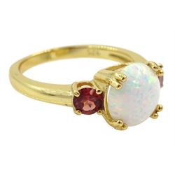 Silver-gilt three stone opal and garnet ring, stamped 925