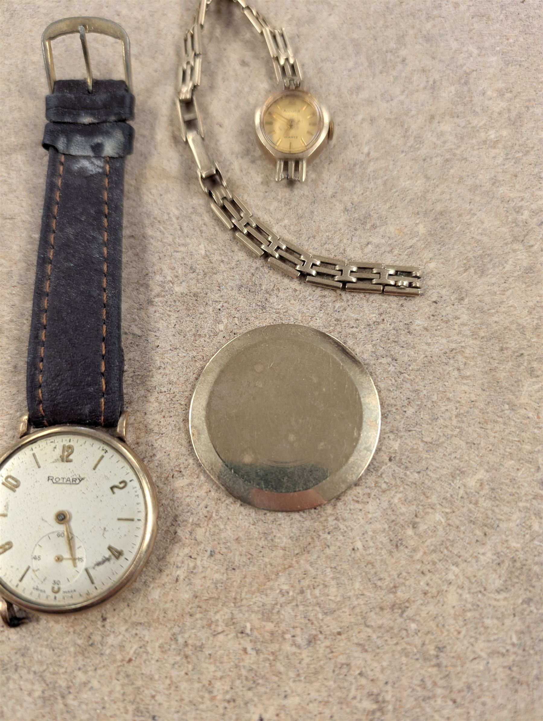 9ct gold watch back case, ladies 9ct gold manual wind wristwatch on 9ct gold strap and a 9ct gold cased wristwatch on leather strap