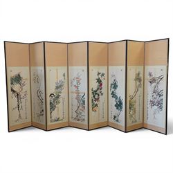 Large 20th century eight panel folding screen decorated with Chinese watercolours of bloss...
