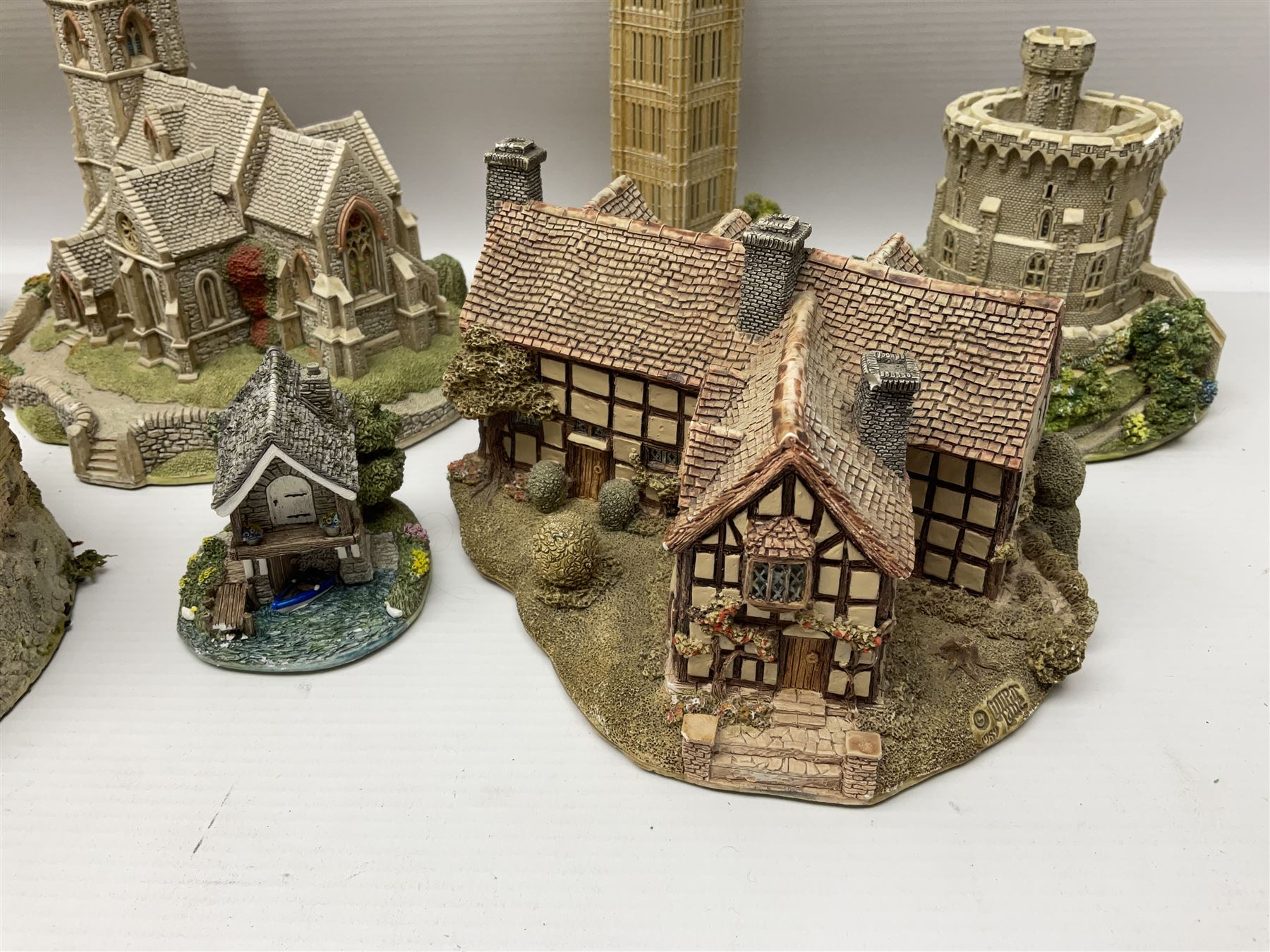 Twenty six Lilliput Lane models, to include Golden Harvest, Junk and Disorderley, Heaven Lea Cottage, Old Scrumpy Farm, Chantry Chapel Wakefield, etc, together with four similar cottages