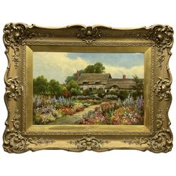 G B Wilson (British 19th/20th century): 'Anne Hathaway's Cottage', oil on canvas signed, titled verso 39cm x 60cm