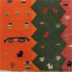 South West Persian Qahgai pictorial flatweave kilim, design arranged in a series of irregular vertical bands in shades of indigo, blue, madder red, pink, green, and ivory, each band filled with naïve pictorial and symbolic motifs of stylized human figures, sheep, goats, and birds