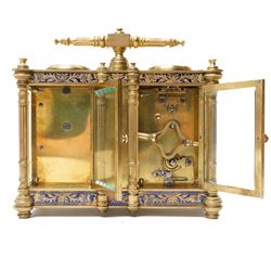 French-late 19th century combination brass carriage timepiece with barometer, thermometer and compass, with a fluted T bar handle and eight matching columns with turned finials, bands of fretted brass to the base and cornice and conforming decoration to the dial masks and dial centres, with silvered chapters to the time dial and barometer and a mercury thermometer between, the top with a circular bevelled viewing glass to the escapement and compass to the other, with a single train 8-day movement and cylinder platform escapement.  With key.