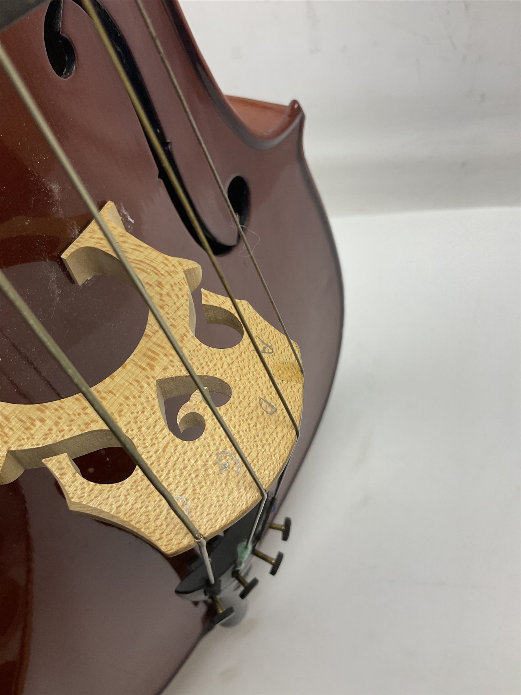 Modern Hungarian half-size cello with 69cm two-piece maple back and ribs and spruce top L114cm overall; and Stentor half size cello bearing label 'The Stentor Student II'; each in soft carrying case (2)