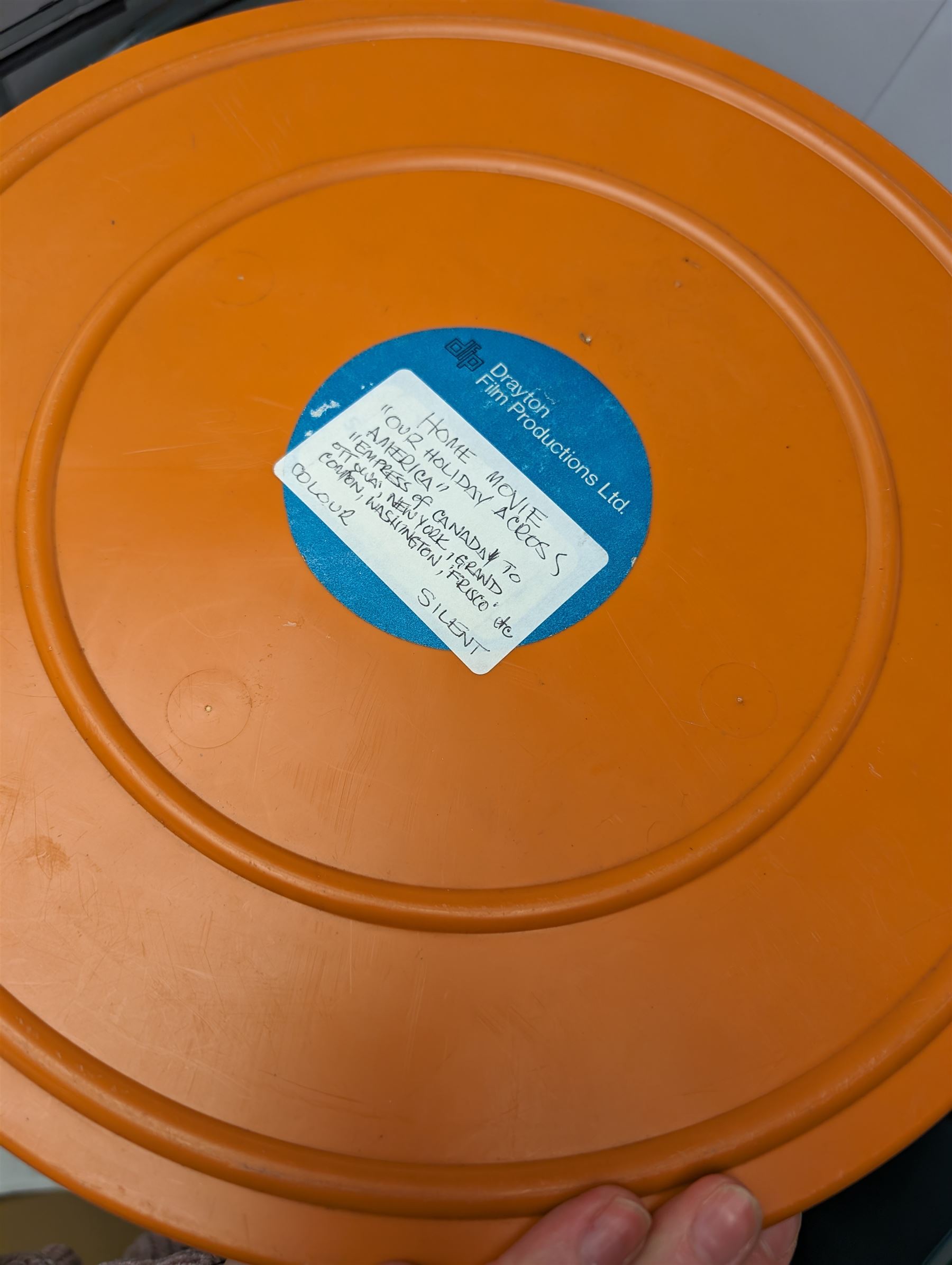 Bell & Howell TQ III 16mm film projector, together with lenses and spare projector lamps and a quantity of 16mm film reels, including Kellogg advert, Tex Avery cartoon and other film reels