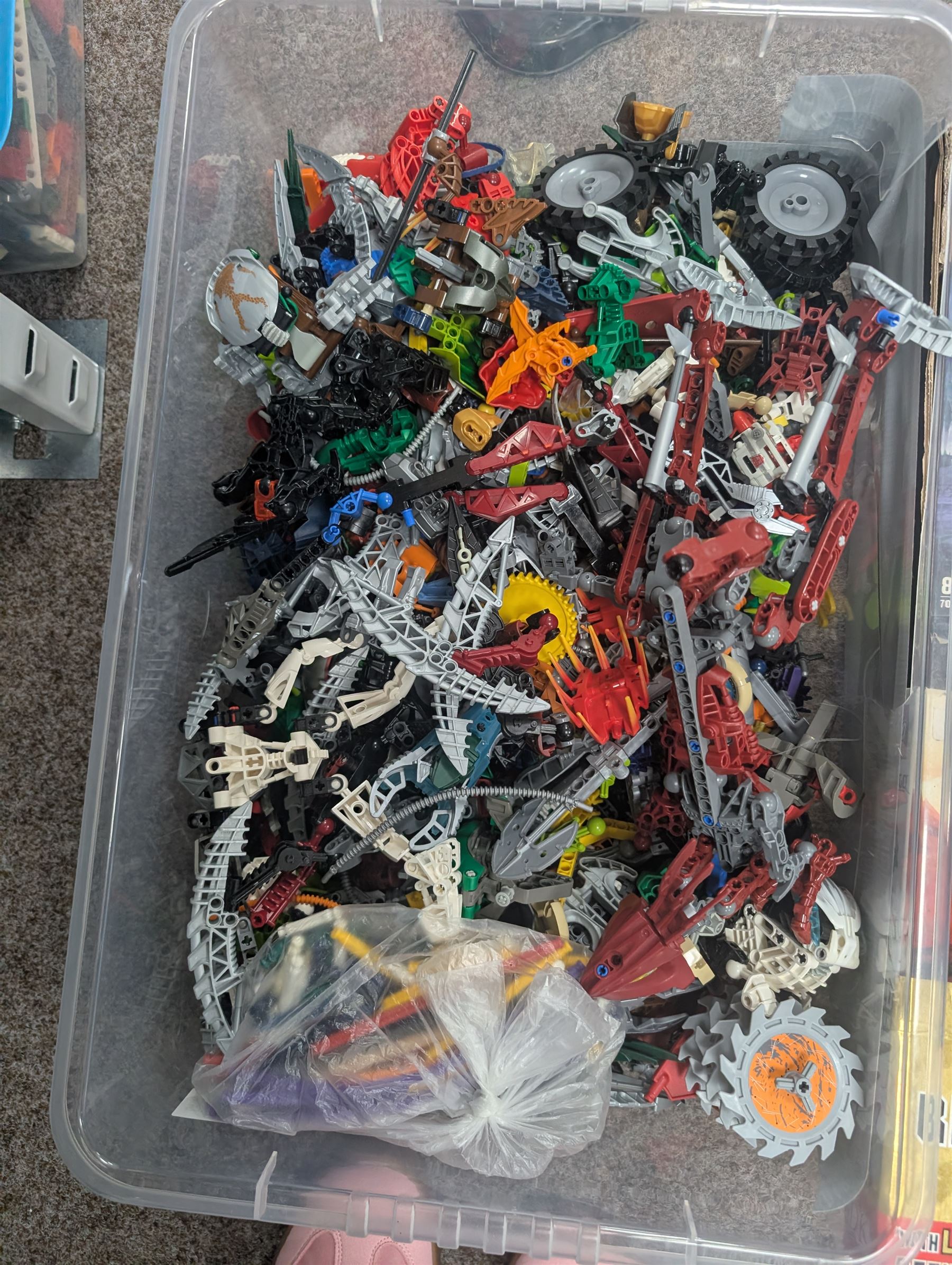 Lego Bionicle and similar part built figures and parts, including boxed sets and loose, together with a Lego Ninjago Build Your Own Adventure set and ten LEDlite Legends of Chima keyrings