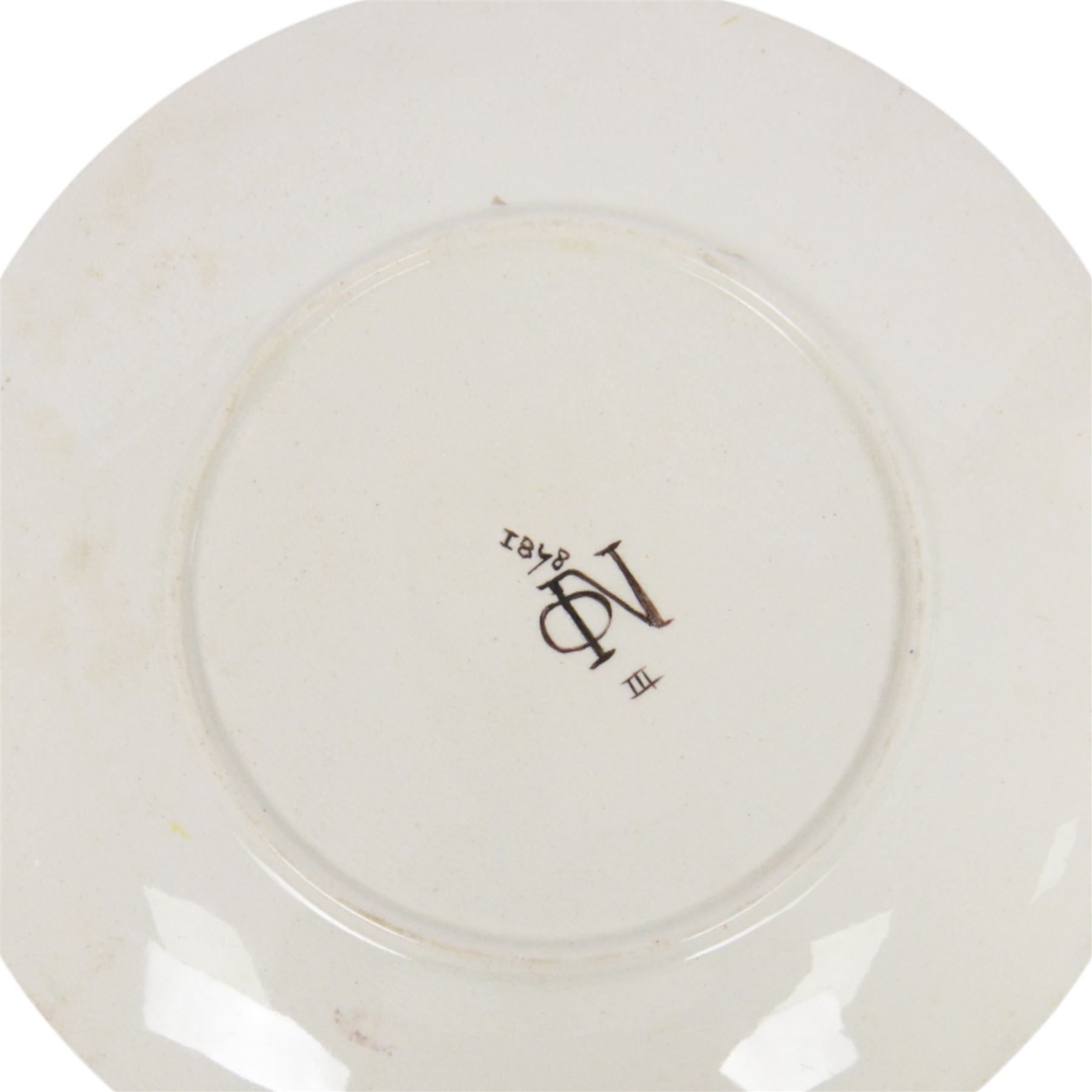 Iznik stlye plate, tin-glazed earthenware decorated with flowers and foliage, with impressed makers mark beneath, D25cm