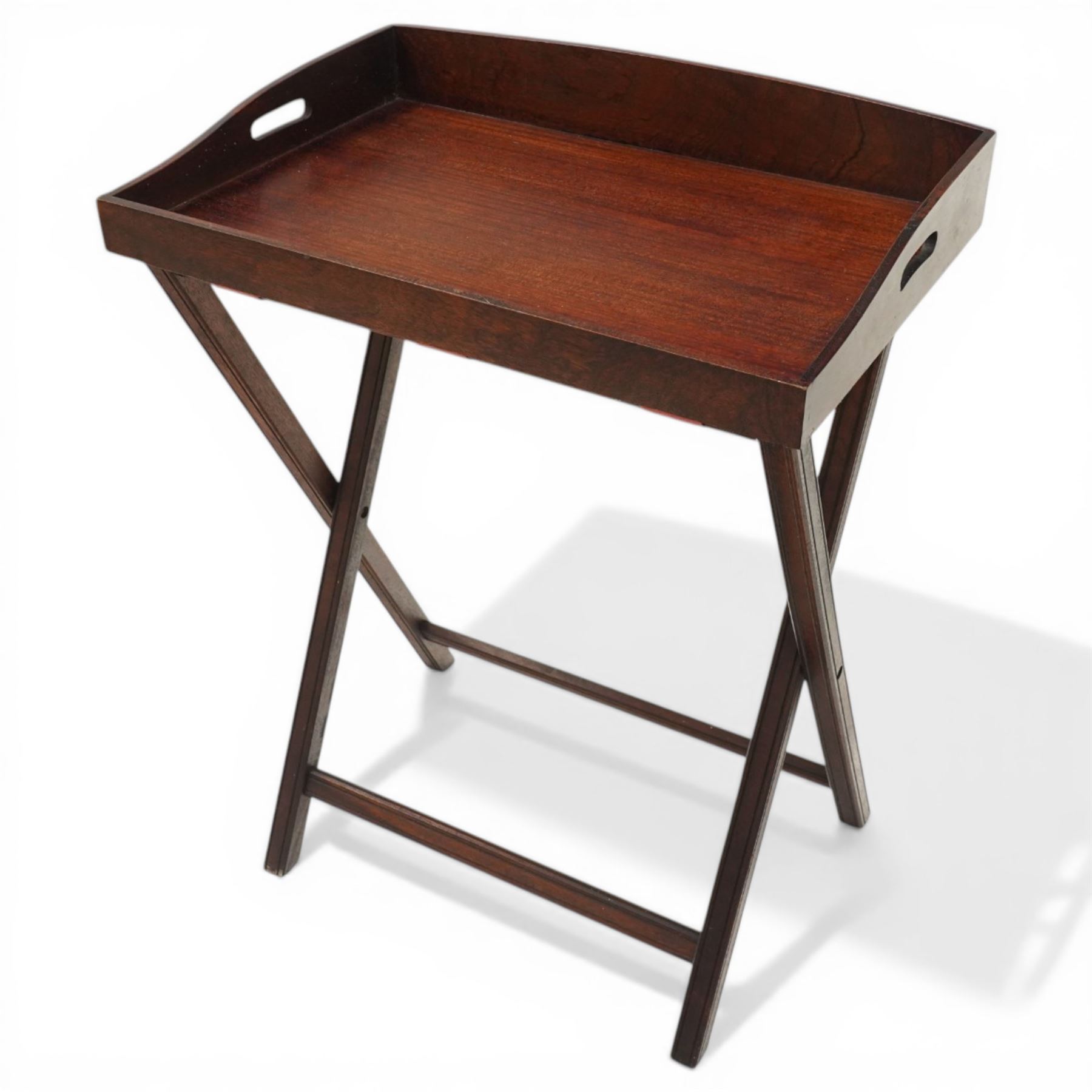 Georgian design mahogany butlers tray on stand, tray top with pierced handles, on a folding X-frame base
