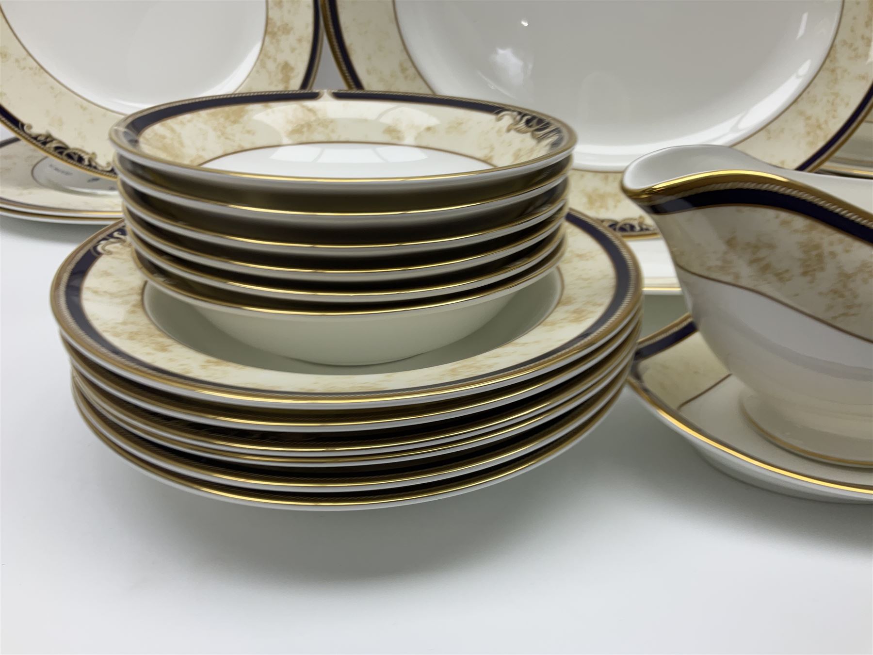 Wedgwood Cornucopia part dinner service, comprising six dinner plates, six soup bowls, six bowls, two serving platters, two oval dishes, covered serving dish, sauce boat and saucer (25)