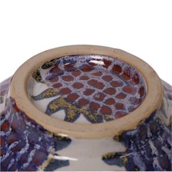 Sophie Hamilton (1963- ); Sunflower bowl, decorated with blue and purple sunflowers on a pale blue ground, with makers mark beneath, D23cm 