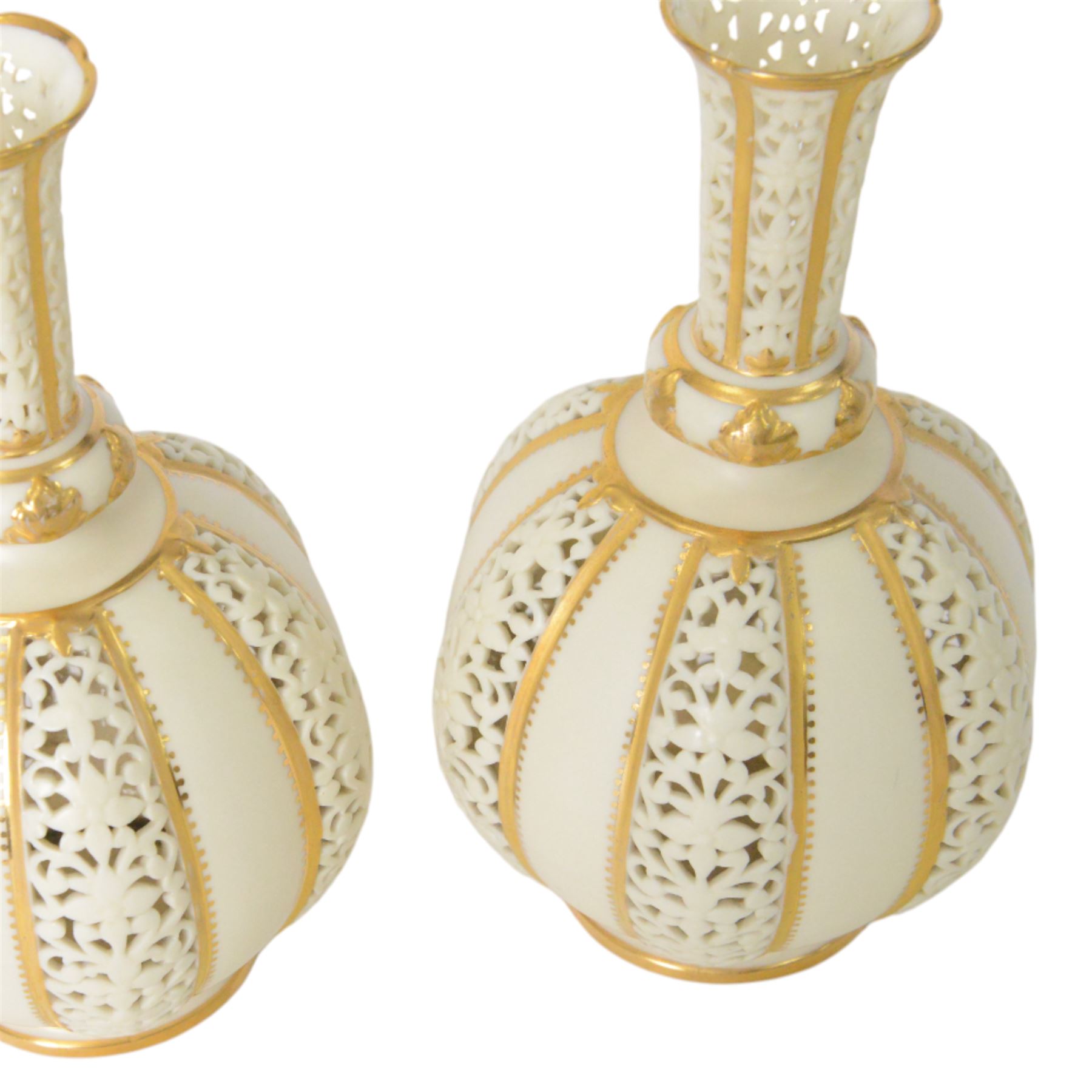 Pair of Grainger & Co. Royal China Works Worcester vases, of globular form with knopped elongated neck, with alternating reticulated panels  and gilt highlights, with printed mark beneath each numbered 1963, H19cm