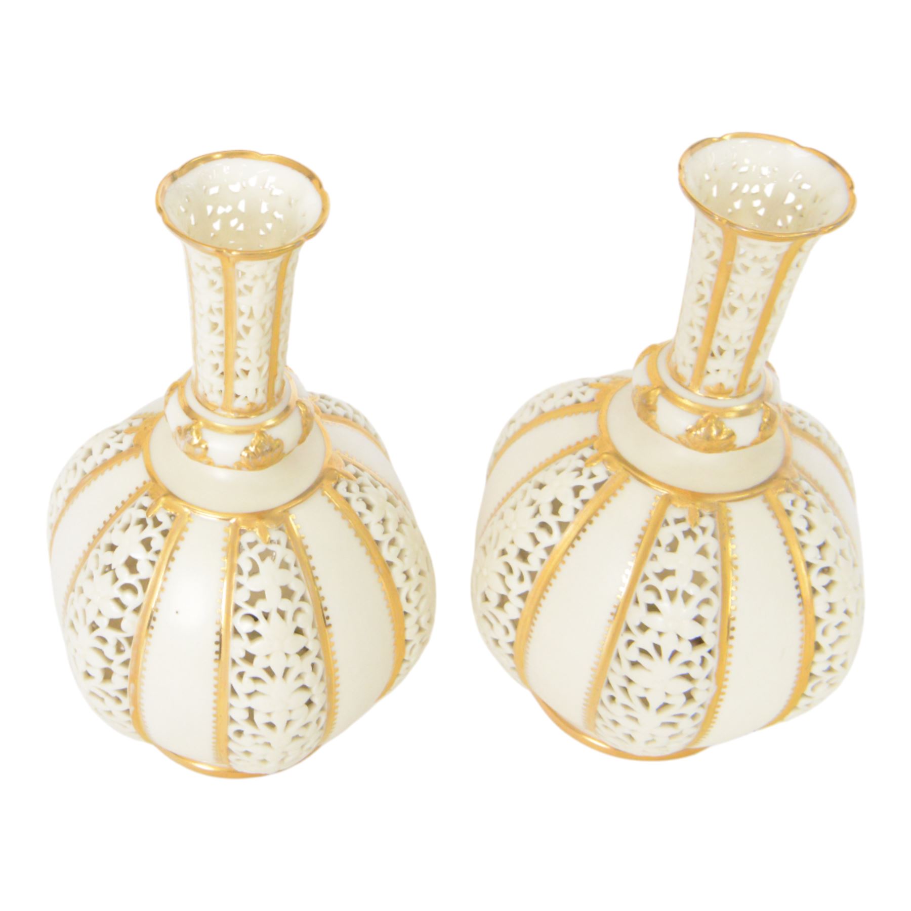 Pair of Grainger & Co. Royal China Works Worcester vases, of globular form with knopped elongated neck, with alternating reticulated panels  and gilt highlights, with printed mark beneath each numbered 1963, H19cm