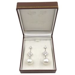 Pair of platinum south sea pearl and diamond pendant stud earrings, with detachable round brilliant cut diamond studs, hallmarked, total diamond weight 3.72 carat, with International Gemological Laboratories report