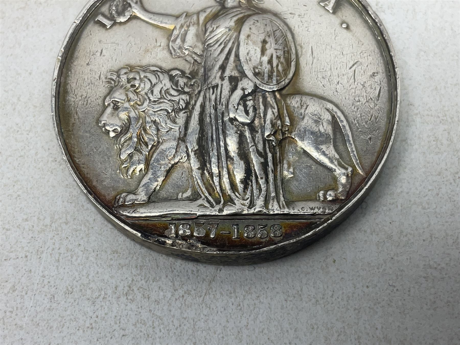 Victoria India Mutiny Medal 1857 - 1858, name erased, with Lucknow clasp and ribbon