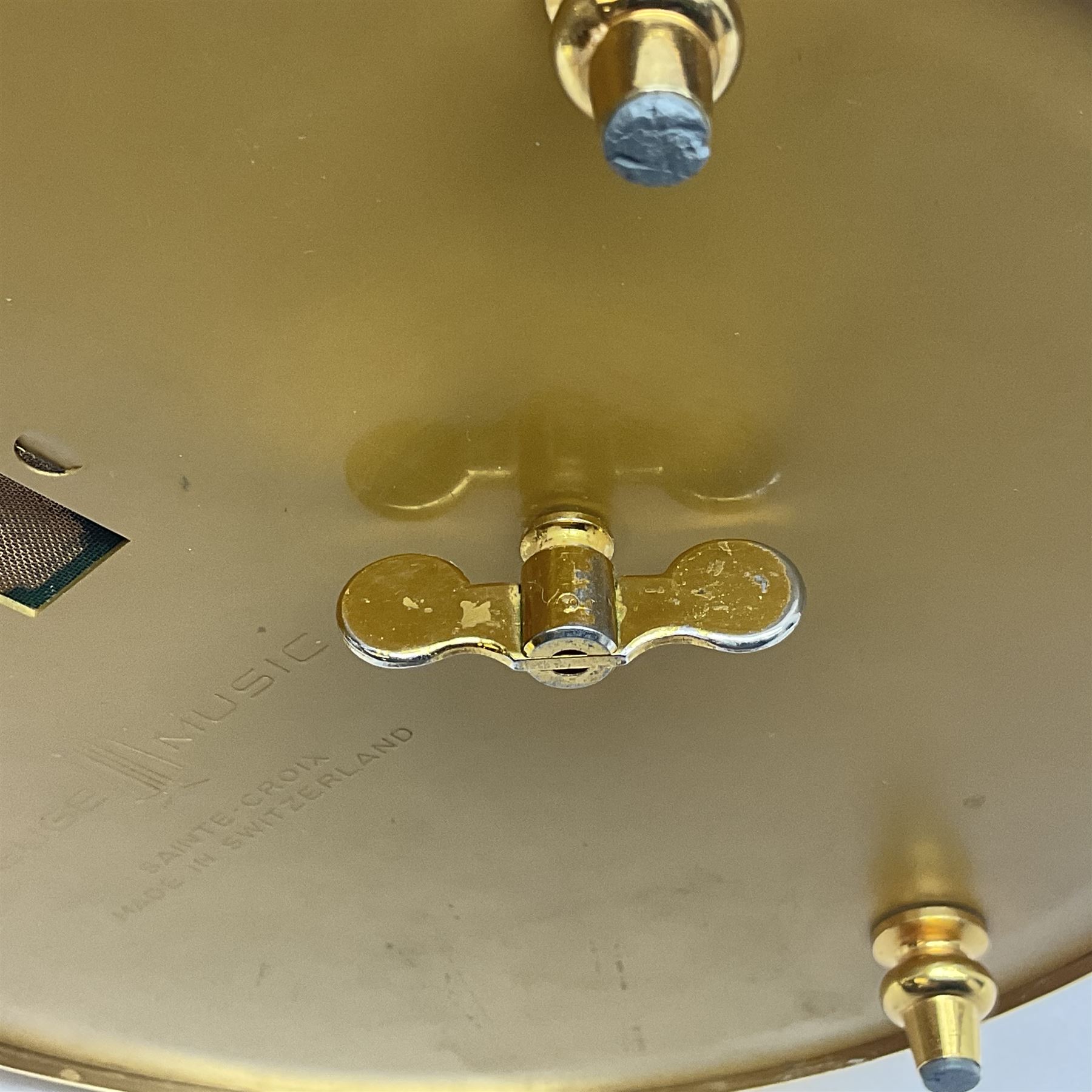 Swiss Reuge Music bird cage automaton music box, the bird with articulated head and beak, in a gilt brass cage, with a glass dome and stand, H30cm