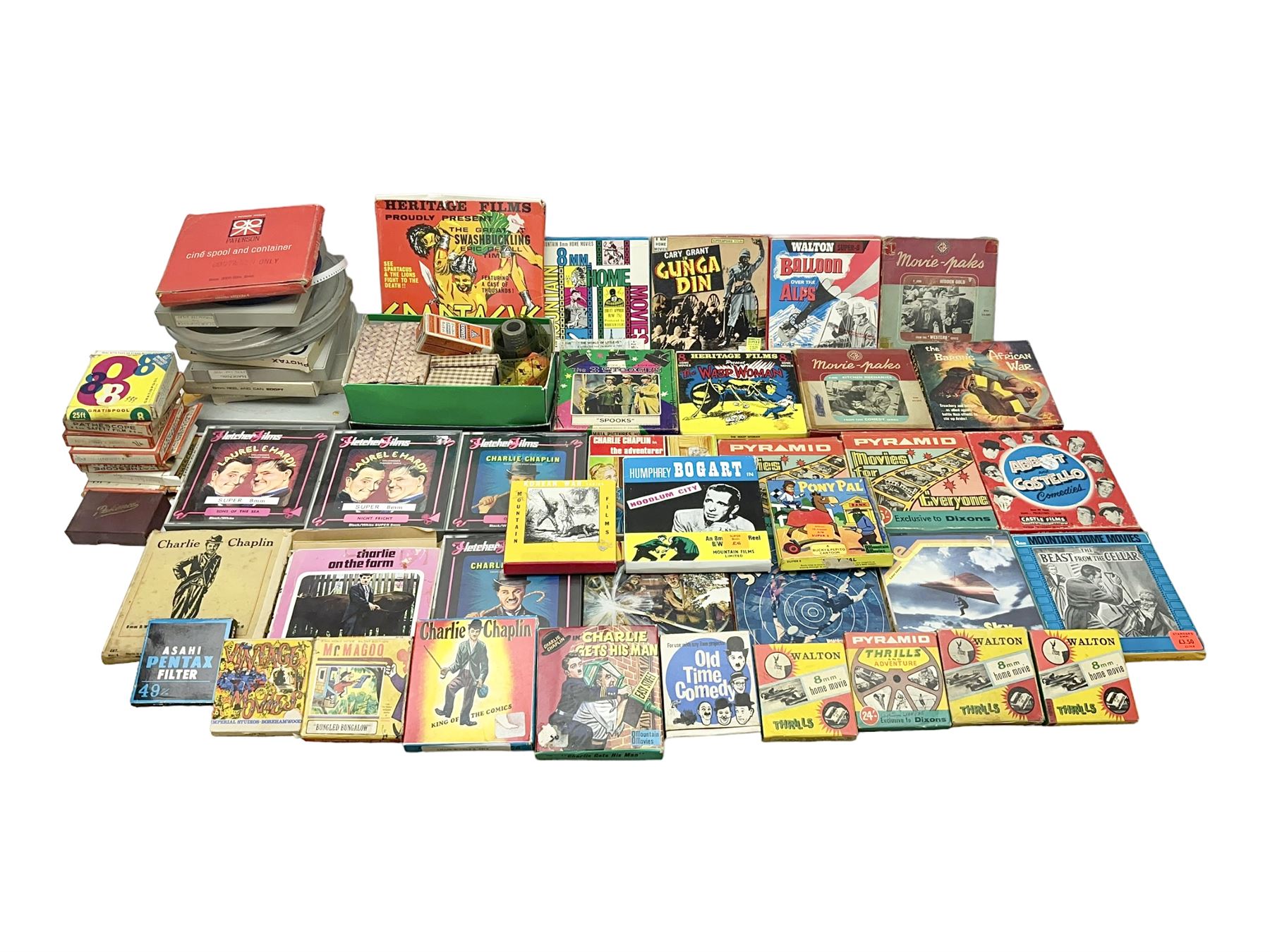 Film reels, mostly 8mm, to include Charlie Chaplin, Laurel & Hardy, The 3 Stooges, Spartacus the Gladiator etc 