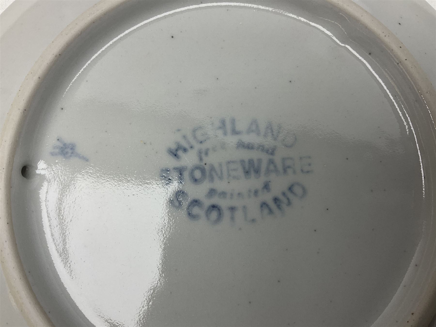 Highland Stoneware Scotland, decorated with landscapes and seascapes, comprising of two bowls, plate and two covered trinket boxes 