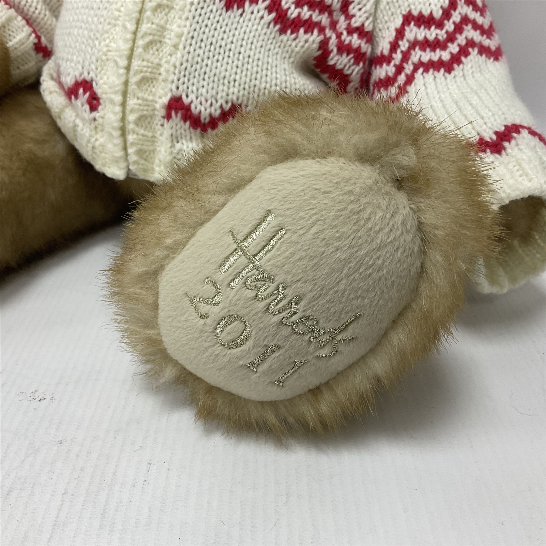 Six Harrods annual teddy bears, dating between 2011 and 2016, tallest H38cm