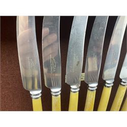 Elkington & Co part canteen of silver plated and stainless steel cutlery, to include simulated ivory handled examples, housed in oak and mahogany case, lock plate stamped 'Acme, British Made', W49cm D31cm H18cm