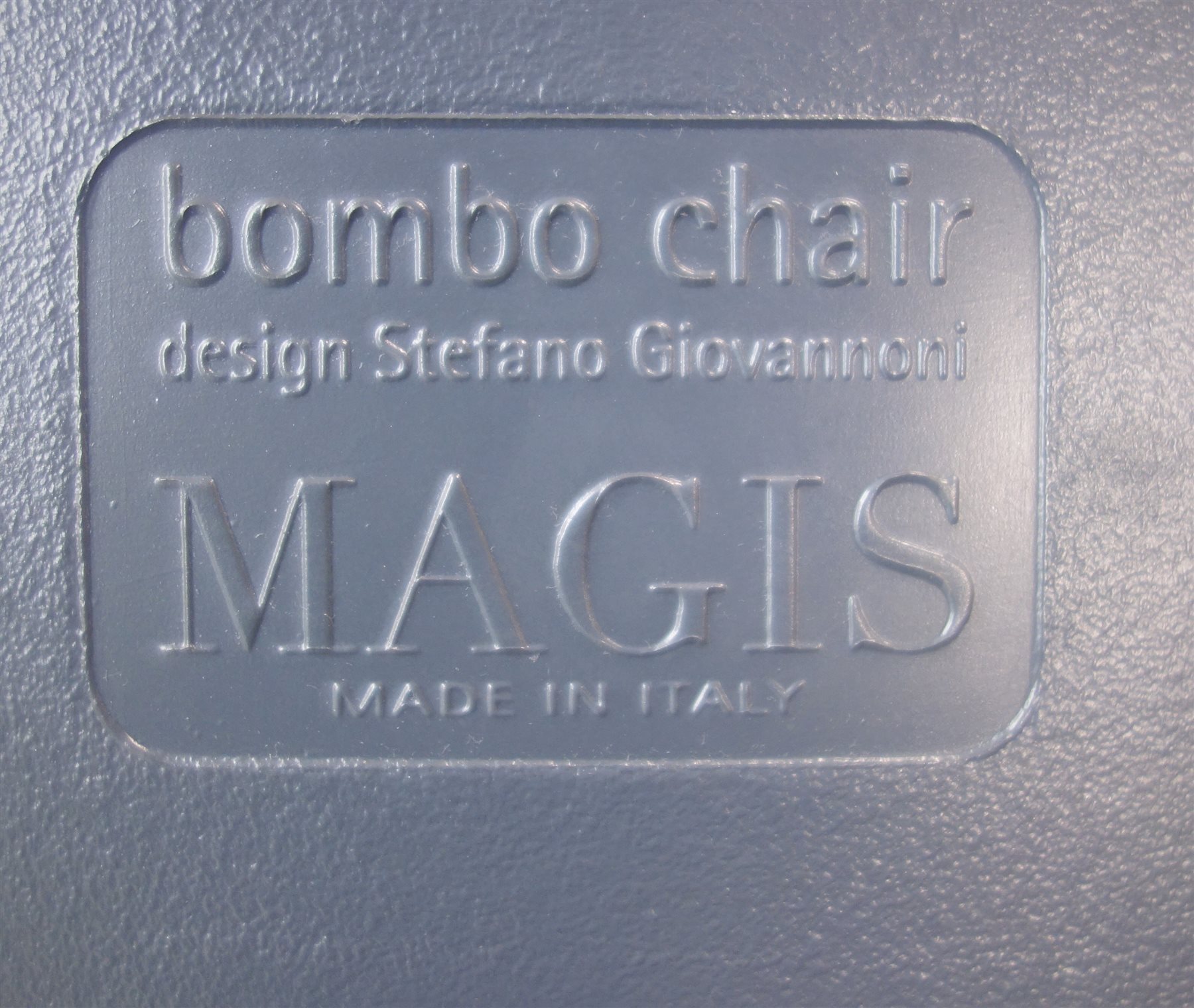 Magis Bombo Anthracite oval dining table, tulip style chrome finish base (W170cm, H76cm,D110cm) and four adjustable egg chairs