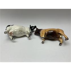 Two Beswick models, comprising Jersey bull model no 1422, H11.5cm, and Friesian cow model no 1362a, H11.5cm, both with printed mark beneath. 